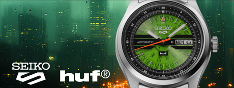 Seiko 5 HUF limited edition with a green dial and a green background with a city in the rain