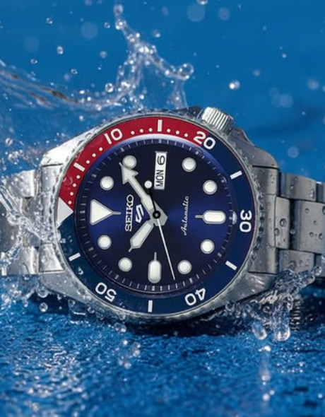 Seiko 5 Pepsi dropped in the water making a splash